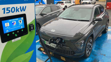 Hyundai Kona Electric connected to a rapid-charging station 